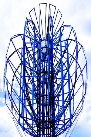 Blue abstract unusual costruction outdoor on cloudly backgroundの写真素材