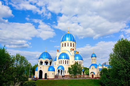 Blue abstract church in Moscow, Russia and bright skyの写真素材