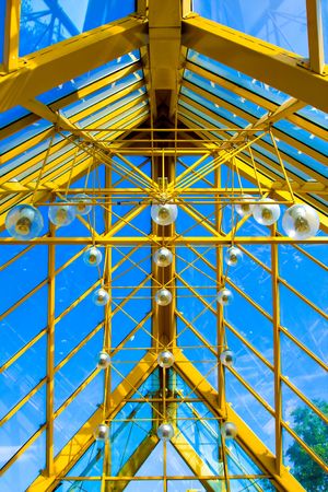 Yellow abstract ceiling in office centerの写真素材