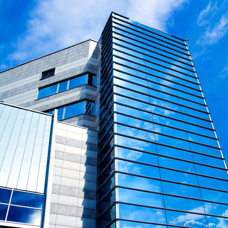 Modern skyscraper business center on blue sky background