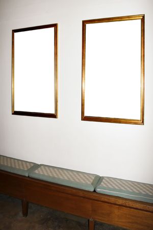 wall in museum with empty framesの写真素材