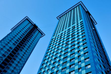 New modern skyscraper on blue sky backgroundの写真素材