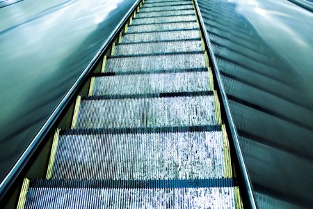 Moving escalator in the metro stationの写真素材