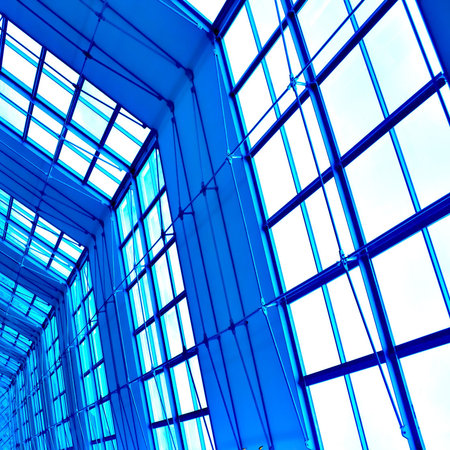 Abstract blue geometric ceiling in office center