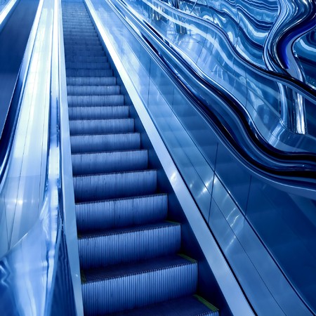 moving escalator in airportの写真素材