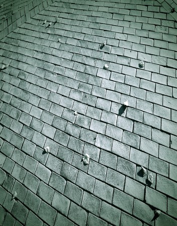 unusual perspective red sidewalk in the squareの写真素材