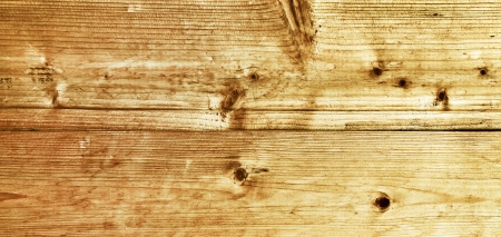 Background of an old wood messy and grungy textureの写真素材
