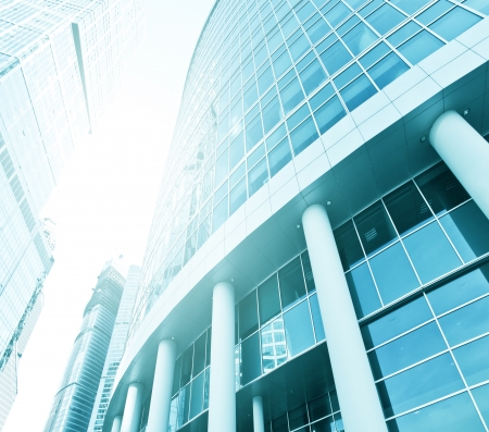 Panoramic and perspective wide angle view to steel blue background of glass high rise building skyscrapers in modern futuristic downtown at night
Business concept of successful industrial architectureの写真素材