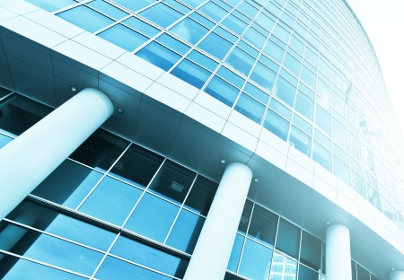 Panoramic and perspective wide angle view to steel blue background of glass high rise building skyscrapers in modern futuristic downtown at night
Business concept of successful industrial architectureの写真素材