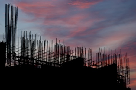 construction equipment and elements of a building under construction の写真素材