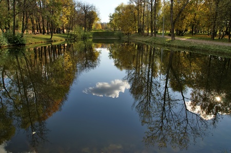 autumn landscape with a pond, Vorontsov Park, Moscow, Russiaの写真素材