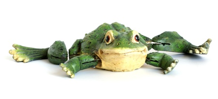 Souvenir comic figure of a large green frog (ceramics), isolated on whiteの写真素材