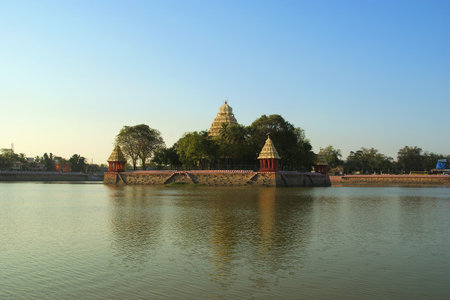 Traditional Hindu temple on lake in the city center, South India, Kerala, Maduraiの写真素材