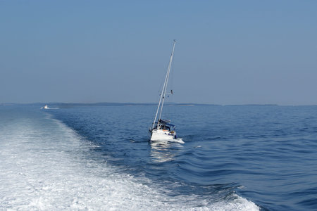 Seascape with yacht on a sunny summer day