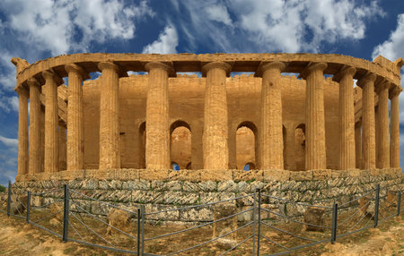 Panorama Ancient Greek temple of Concordia (V-VI century BC), Valley of the Temples, Agrigento, Sicily. The area was included in the UNESCO Heritage Site list in 1997の写真素材
