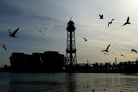 Passenger port in Barcelona with cable car towerの写真素材