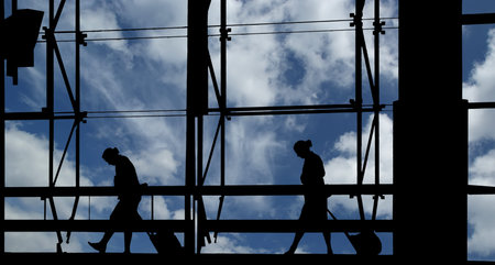 People silhouettes at airport building