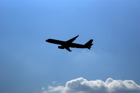 Flight of modern combat fighters on the sky background