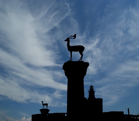Rhodes island landmark, Mandraki Port, Greece. The historical port is still used today as a marina by small yachts and ferriesの写真素材
