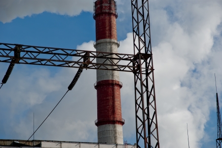 electric pylon and  pipes of coal  burning power stationの写真素材