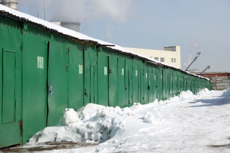 typical garage arrangement of Moscow, Russia. Many people can rent a garage for car or material.のeditorial素材