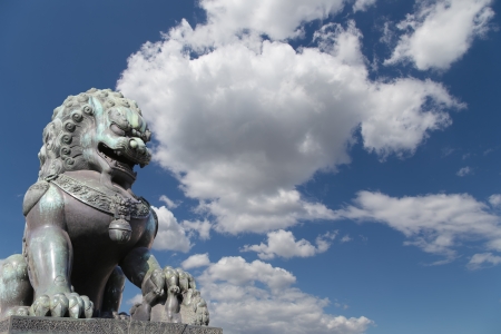 Bronze Guardian Lion Statue in the Forbidden City, Beijing, China の写真素材