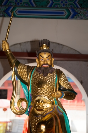 Dharmapala (protector of dharma), Buddhist temple in Beijing, China.  Dharmapala is a type of wrathful deity. The name means Dharma-defender in Sanskrit, also known as the Defenders of the Law (Dharma), or the Protectors of the Lawのeditorial素材