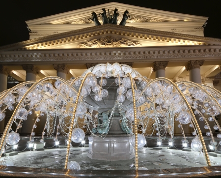 electric fountain at night, lighted during christmas near the Bolshoi Theatre (Large, Great or Grand Theatre, also spelled Bolshoy), Moscow, Russiaのeditorial素材