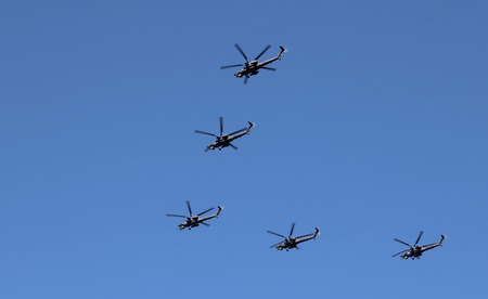 Russian military helicopters fly in formation over Red Square during Victory Day parade, Moscow, Russia.のeditorial素材