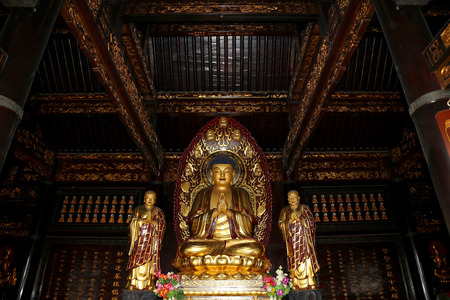 Buddhist Temple. Golden statue of Buddha-- southern Xian (Sian, Xi'an), Shaanxi province, Chinaのeditorial素材