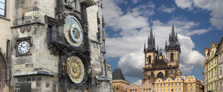The gothic Church of Mother of God in front of Tyn and Astronomical clock in Old Town Square, Prague, Czech Republicの写真素材