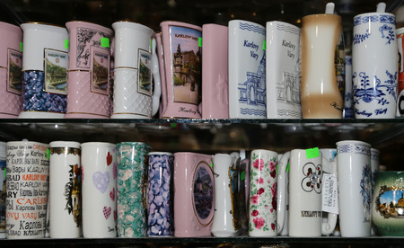 Porcelain cups for mineral water in shop window, Karlovy Vary (Carlsbad), Czech Republicのeditorial素材