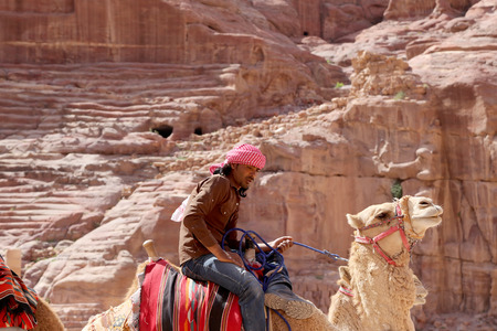 Bedouin on a camel in Petra,  Jordanのeditorial素材