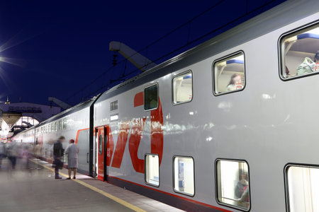 Train on Leningrad railway station at night -- is one of the nine main railway stations of Moscow,...