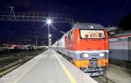Train on Leningrad railway station at night -- is one of the nine main railway stations of Moscow,...