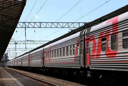 Train on Moscow passenger platform (Belorussky railway station) is one of the nine main railway...