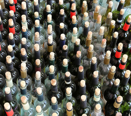 very much stacked up wine bottles  with  corksのeditorial素材
