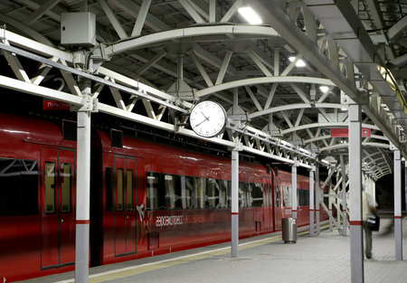 Train on Moscow passenger platform at night (Belorussky railway station) is one of the nine main...