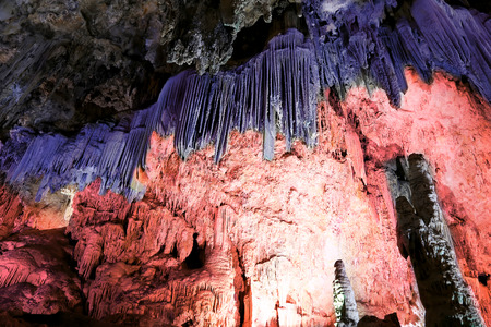 Interior of Natural Cave in Andalusia, Spain -- Inside the Cuevas de Nerja are a variety of geologic cave formations which create interesting patternsの写真素材