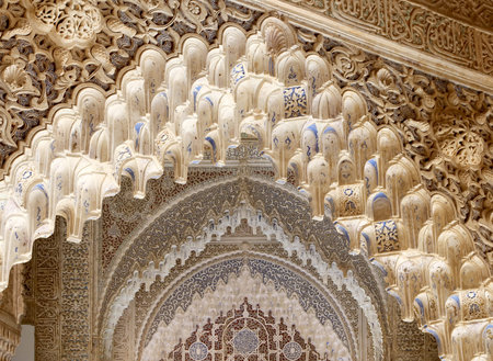 Arches in Islamic (Moorish)  style in Alhambra, Granada, Spain
