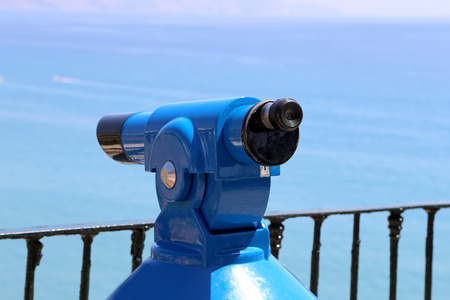 Telescope viewer overlooking from Balcon de Europa in Nerja, Andalusia, Spain. It is on the country southern Mediterranean coast, about 50 km east of Malagaの写真素材