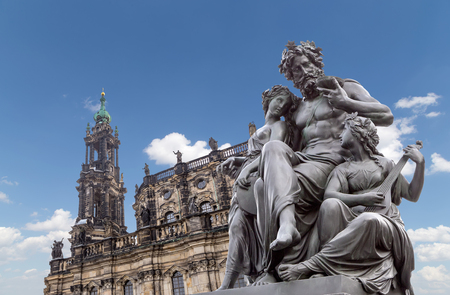 Sculpture on the Bruhl Terrace and  Hofkirche or Cathedral of Holy Trinity - baroque church in Dresden, Sachsen, Germanyの写真素材