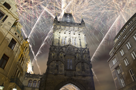 Powder tower (gate) at evening and holiday fireworks in Prague, Czech Republic. It is one of the original city gates, dating back to the 11th century. It is one of the symbols of Prague leading into the Old Town.のeditorial素材