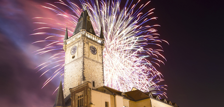 Old Town City Hall in Prague (Night view) and holiday fireworks, view from Old Town Square, Czech Republicの写真素材