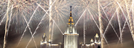 The Main Building Of Moscow State University On Sparrow Hills at Night and holiday fireworks, Russiaのeditorial素材