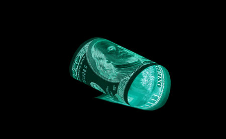 One hundred dollar bills (banknotes )  close up, U.S. currency-- in UV light protection