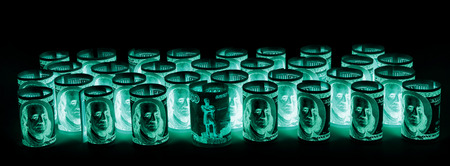 US dollars and Russian roubles banknotes in UV light protectionの写真素材