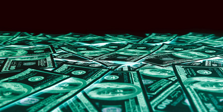 One hundred dollar bills (banknotes )  close up, U.S. currency-- in UV light protectionの写真素材