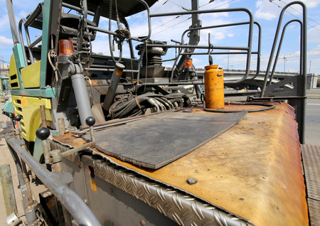 Machine for repair of roads in the modern city (close-up) 