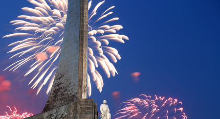 Conquerors of Space Monument in the park outdoors of Cosmonautics museum and fireworks, near VDNK exhibition center, Moscow, Russiaのeditorial素材
